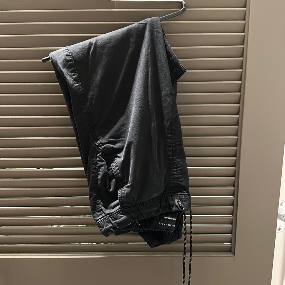 Heavily used American eagle jogger pants faded black men’s size small.